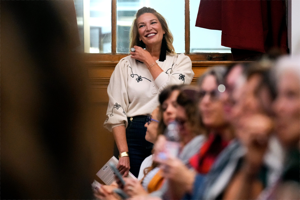 Best-selling Christian writer and influencer Jen Hatmaker waits to be introduced to talk about her new book, "Awake," in Nashville, Tenn., on Sept. 25, 2025. (AP Photo/Mark Humphrey)
