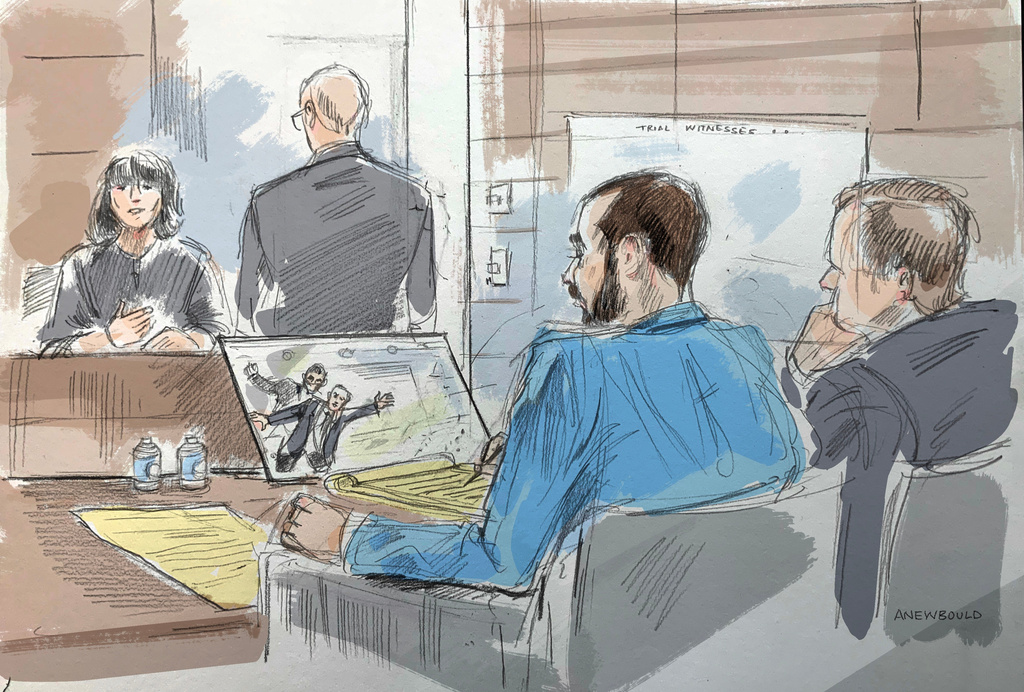 In this courtroom sketch, a witness describes video of an alleged attack on Salman Rushdie by Hadi Matar, in federal court in Buffalo, N.Y., Wednesday, July 22, 2026. Matar, foreground, is seated with his lawyer's co-council. (Alexandra Newbould via AP)
