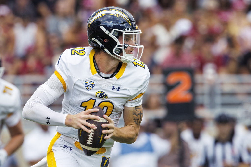 Kent State quarterback Dru DeShields (12) looks for a receiver during the first half of an NCAA college football game against Florida State, Saturday, Sept. 20, 2025, in Tallahassee, Fla. (AP Photo/Colin Hackley)