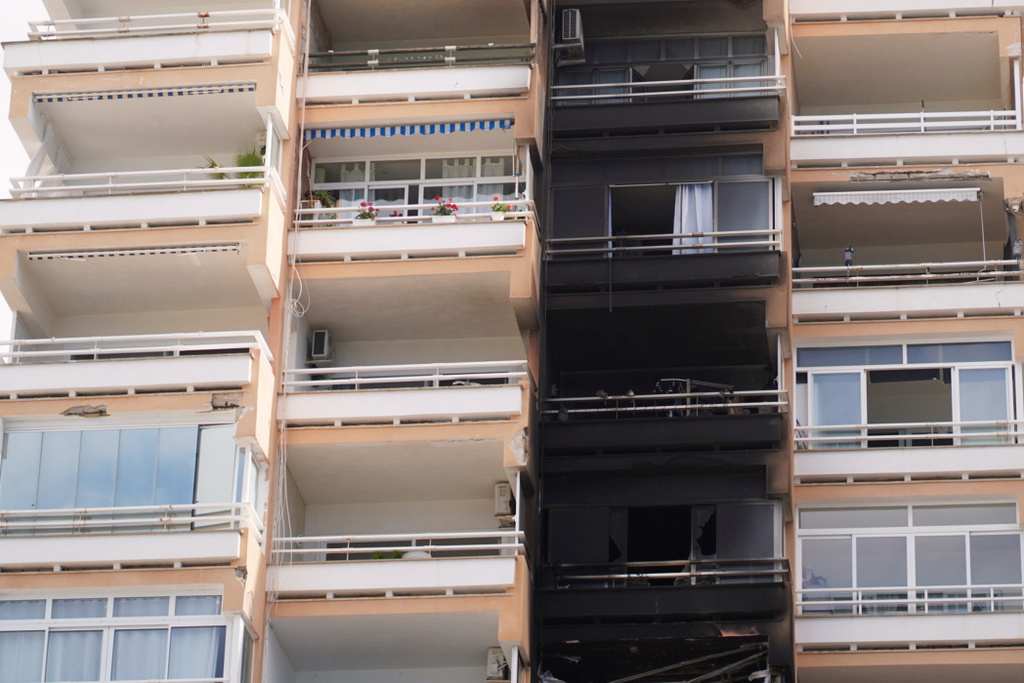A view of a burnt-out apartment following a fire in the resort town of Magaluf, a tourist area on the Spanish island of Mallorca, Thursday, June 11, 2026. (Javier Fernandez/Europa Press via AP)