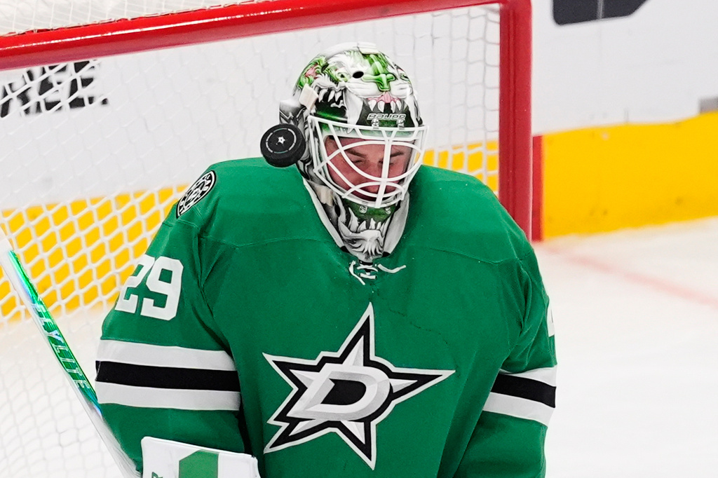 Dallas Stars goaltender Jake Oettinger blocks a shot from the Winnipeg Jets in the second period of an NHL hockey game Thursday, April 2, 2026, in Dallas. (AP Photo/Tony Gutierrez)