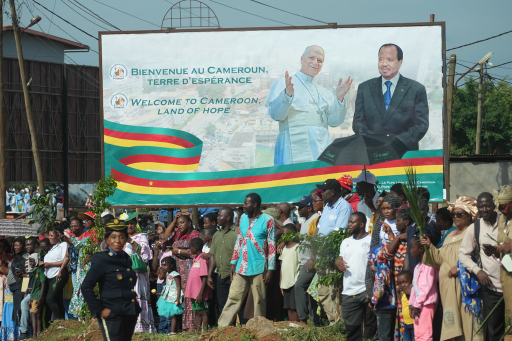 People greet Pope Leo XIV upon his arrival in Yaounde, Cameroon, Wednesday, April 15, 2026, on the third day of an 11-day apostolic journey to Africa. (AP Photo/Andrew Medichini)