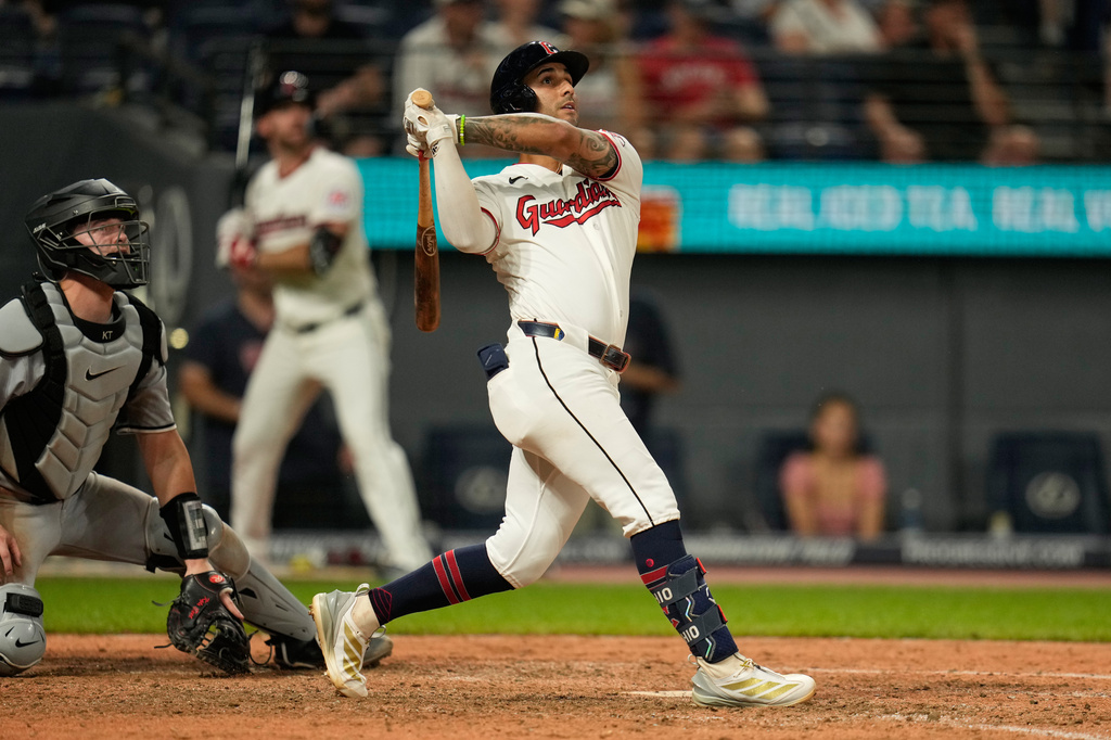 Cleveland Guardians' Brayan Rocchio watches his game winning home run in the ninth inning of a baseball game against the Chicago White Sox in Cleveland, Thursday, July 2, 2026. (AP Photo/Sue Ogrocki)