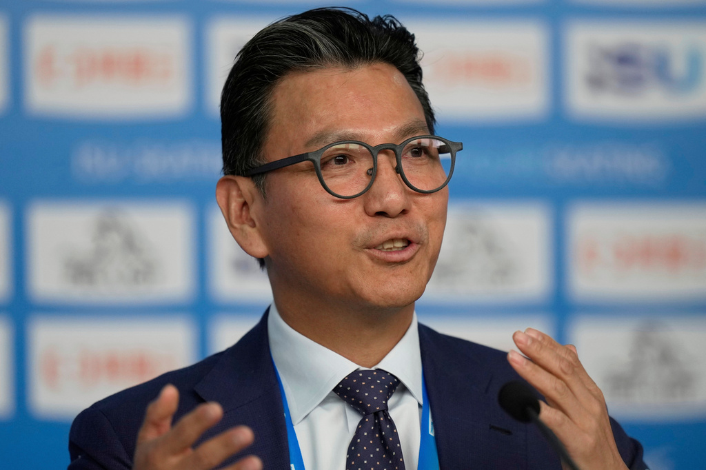 FILE - International Skating Union President Jae Youl Kim address media during the ISU Skate to Milano figure skating qualifier in Beijing, China, on Sept. 19, 2025. (AP Photo/Mahesh Kumar A., File)