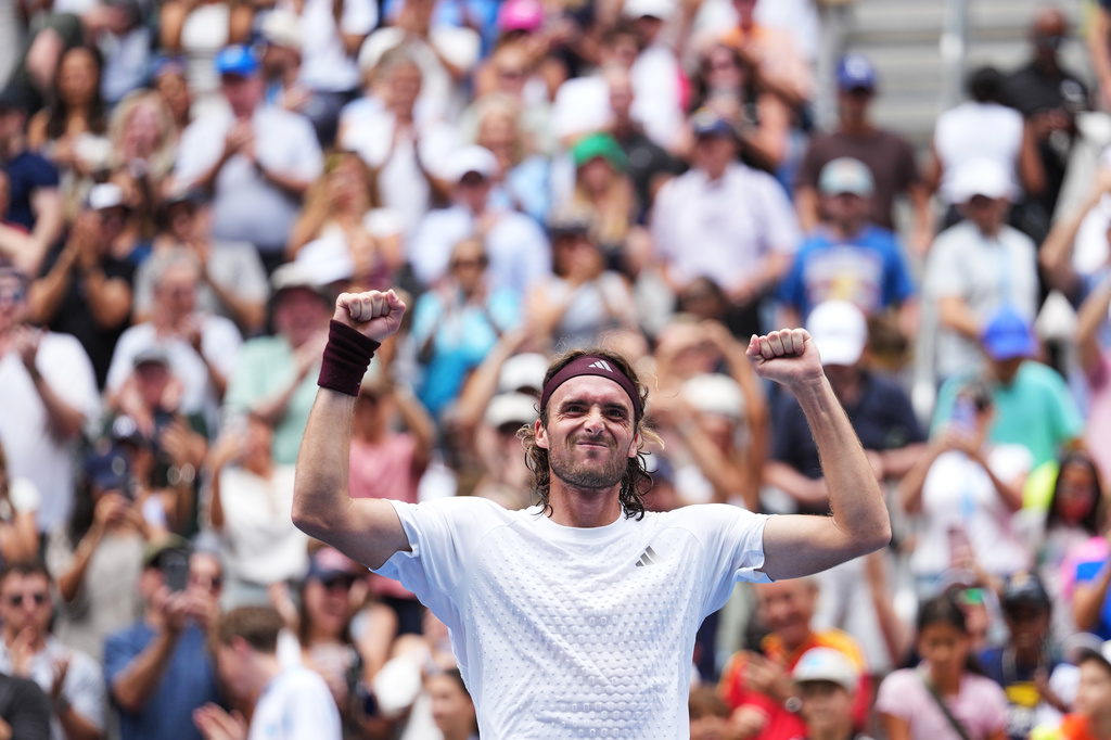 Stefanos Tsitsipas, of Greece, celebrates winning a match against Arthur Fils, of France, during the first round of the U.S. Open tennis championships, Monday, Aug. 31, 2026, in New York. (AP Photo/Kirsty Wigglesworth)