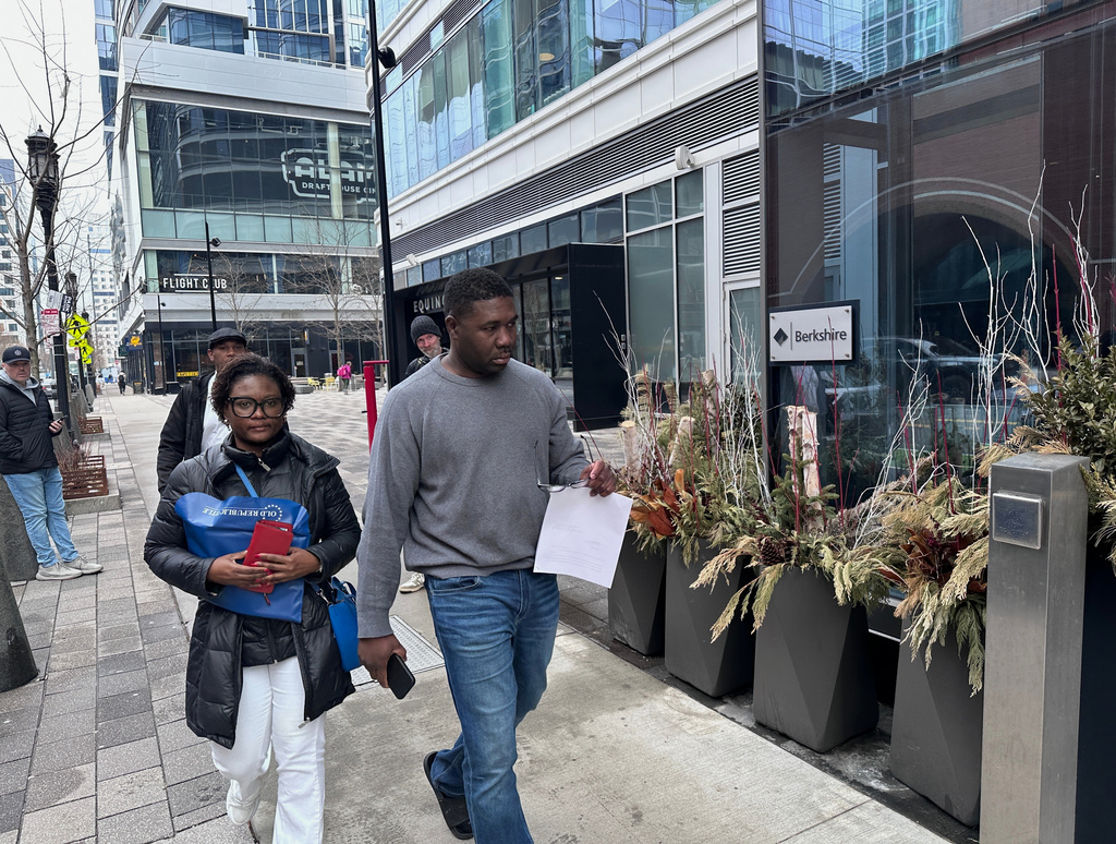 Edouardo St. Fort, right, leaves federal court after making a first appearance in connection with a New York corruption case, Tuesday, March 31, 2026, in Boston. (AP Photo/Michael Casey)