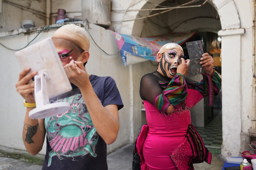 Drag artists apply makeup for the Day of the Dead Catrina parade in Mexico City, Sunday, October. 26, 2025. (AP Photo/Claudia Rosel) Drag artists apply makeup for the Day of the Dead Catrina parade in Mexico City, Sunday, October. 26, 2025. (AP Photo/Claudia Rosel)