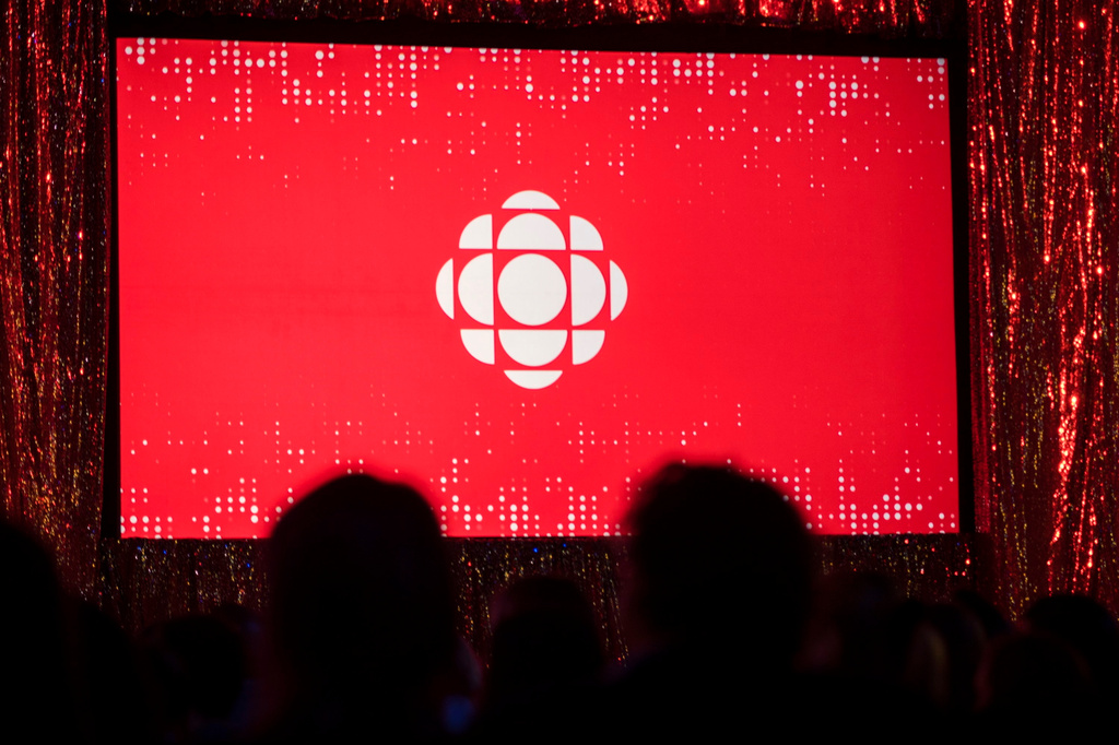 FILE - The Canadian Broadcasting Corporation logo is projected onto a screen on May 29, 2019, in Toronto. (Tijana Martin/The Canadian Press via AP,File)