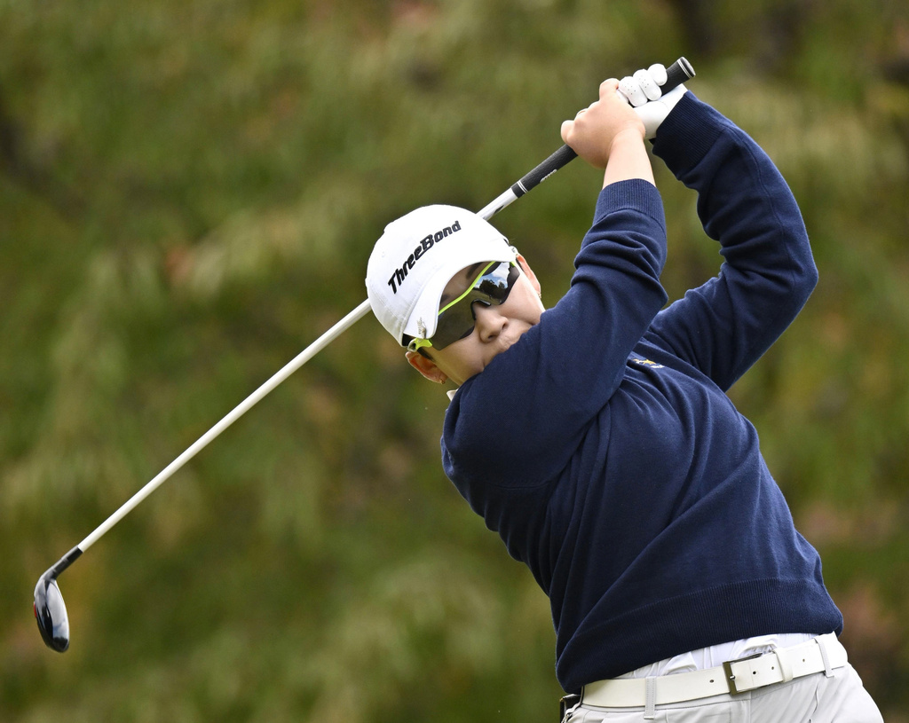 South Korea's Shin Ji-yai plays a shot on the first round of the LPGA's Toto Japan Classic in Otsu, Shiga prefecture, Japan Thursday, Nov. 6, 2025. (Kyodo News via AP)