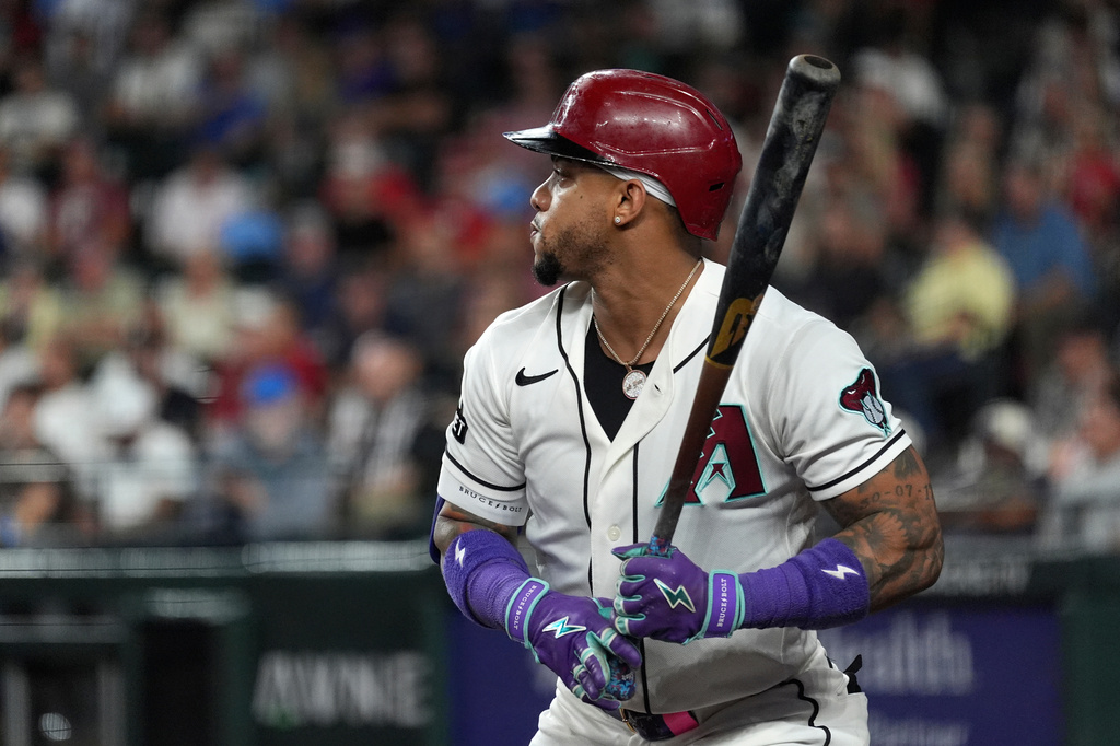 Arizona Diamondbacks designated hitter Ketel Marte waits to bat against the Philadelphia Phillies during the first inning of a baseball game, Monday, Aug. 31, 2026, in Phoenix. (AP Photo/Ross D. Franklin)