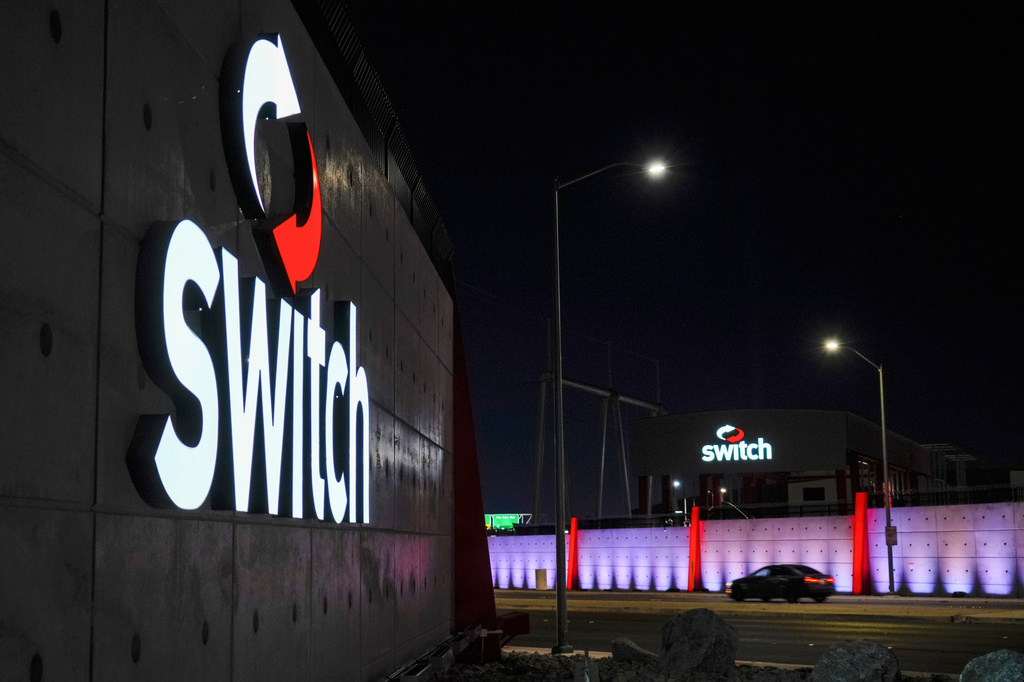 Lights illuminate a Switch data center, Wednesday, April 1, 2026, in Las Vegas. (AP Photo/Ty ONeil)