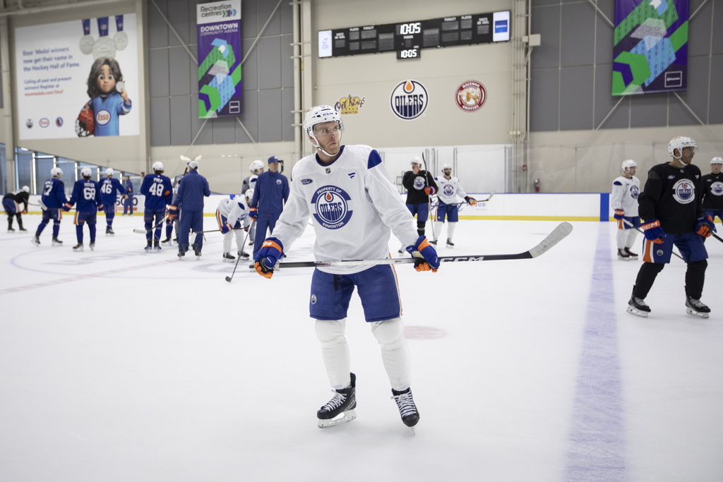Edmonton Oilers' Connor McDavid (97) looks on during NHL hockey training camp in Edmonton, Alberta, Thursday, Sept. 18, 2025. (Amber Bracken/The Canadian Press via AP)