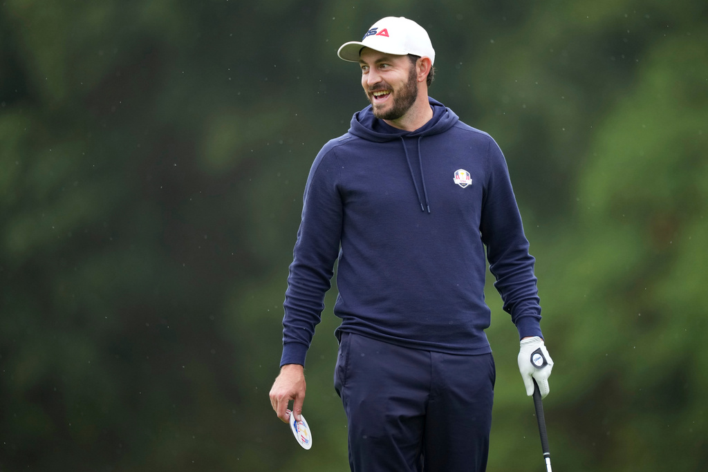 United States' Patrick Cantlay smiles on the 10th hole during a practice round at the Ryder Cup golf tournament, Thursday, Sept. 25, 2025, on the Bethpage Black golf course, in Farmingdale, N.Y. (AP Photo/Matt Slocum)