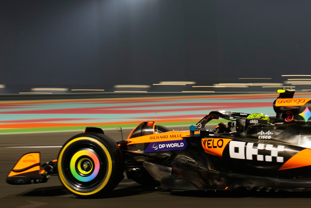 McLaren driver Lando Norris of Britain steers his car during the Qatar Formula One Grand Prix, at the Lusail International Circuit, in Lusail, Qatar, Sunday, Nov. 30, 2025. (AP Photo/Darko Bandic)