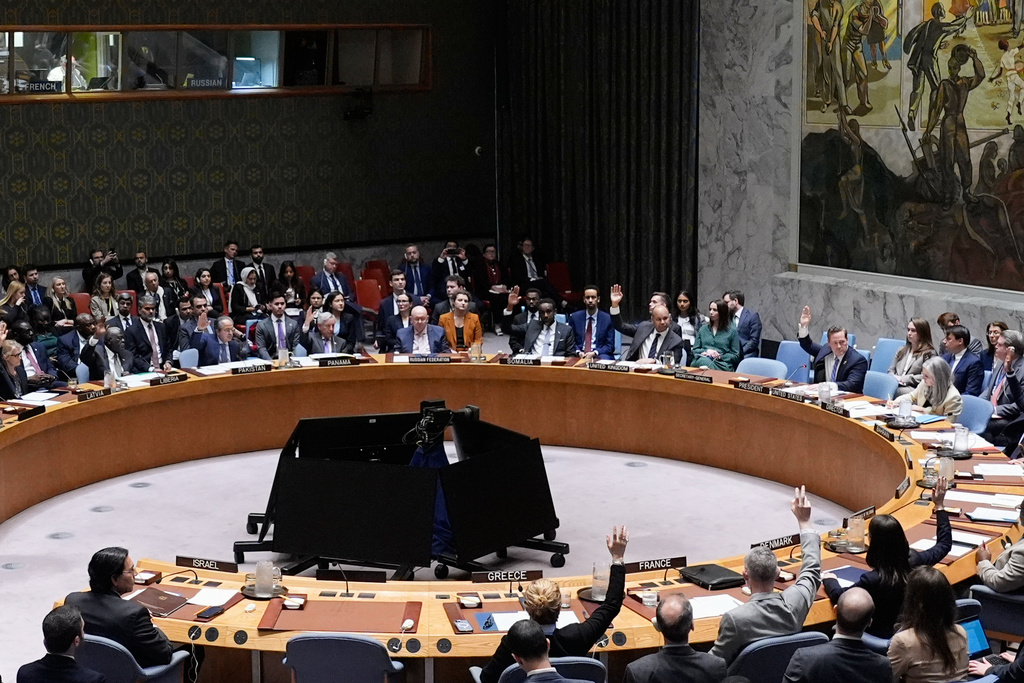 Members of the Security Council vote on a resolution at United Nations headquarters, Wednesday, March 11, 2026. (AP Photo/Seth Wenig)