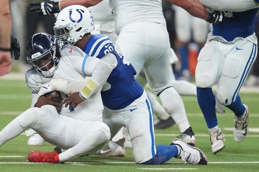 Tennessee Titans quarterback Cam Ward (1) is sacked by Indianapolis Colts defensive tackle DeForest Buckner (99) during the second half an NFL football game, Sunday, Oct. 26, 2025, in Indianapolis. (AP Photo/Michael Conroy) Tennessee Titans quarterback Cam Ward (1) is sacked by Indianapolis Colts defensive tackle DeForest Buckner (99) during the second half an NFL football game, Sunday, Oct. 26, 2025, in Indianapolis. (AP Photo/Michael Conroy)