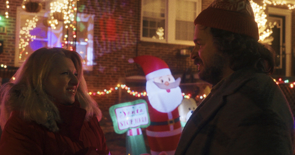 This image released by IFC Films shows Liz Larsen, left, and Michael Strassner in a scene from "The Baltimorons." (IFC Films via AP)