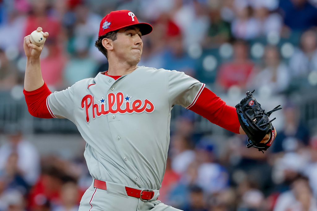 Philadelphia Phillies starting pitcher Andrew Painter delivers to an Atlanta Braves batter during the first inning of a baseball game, Friday, April 24, 2026, in Atlanta. (AP Photo/Erik S. Lesser)