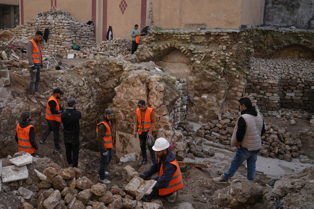 Workers inspect Hamam al-Sumara, a historic bathhouse in Gaza City, after it was heavily damaged during the Israel-Hamas war, Tuesday, Jan. 27, 2026. (AP Photo/Jehad Alshrafi)
