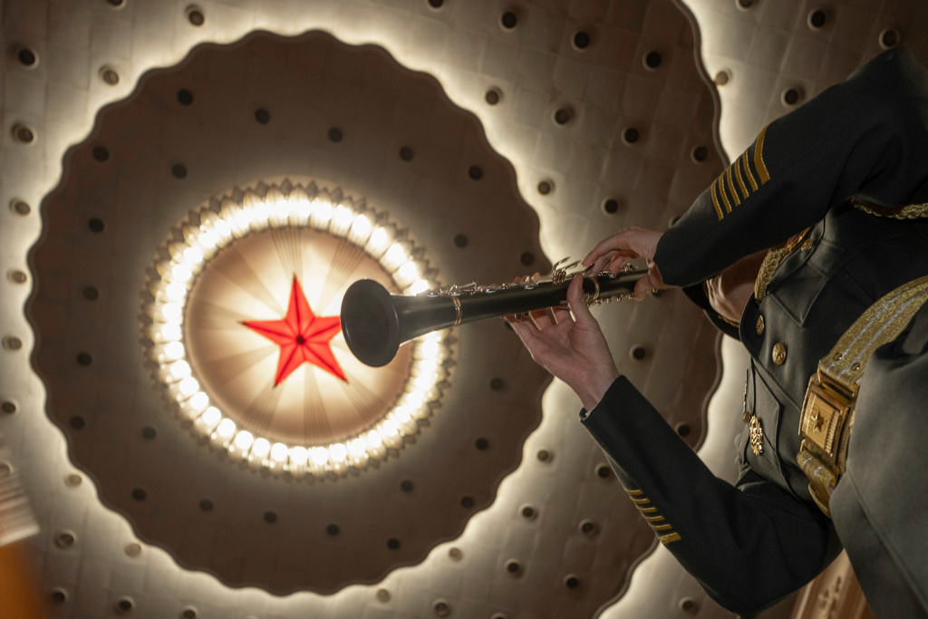 A military band member rehearses before the closing session of the National People's Congress (NPC) at the Great Hall of the People in Beijing, Thursday, March 12, 2026. (AP Photo/Ng Han Guan)