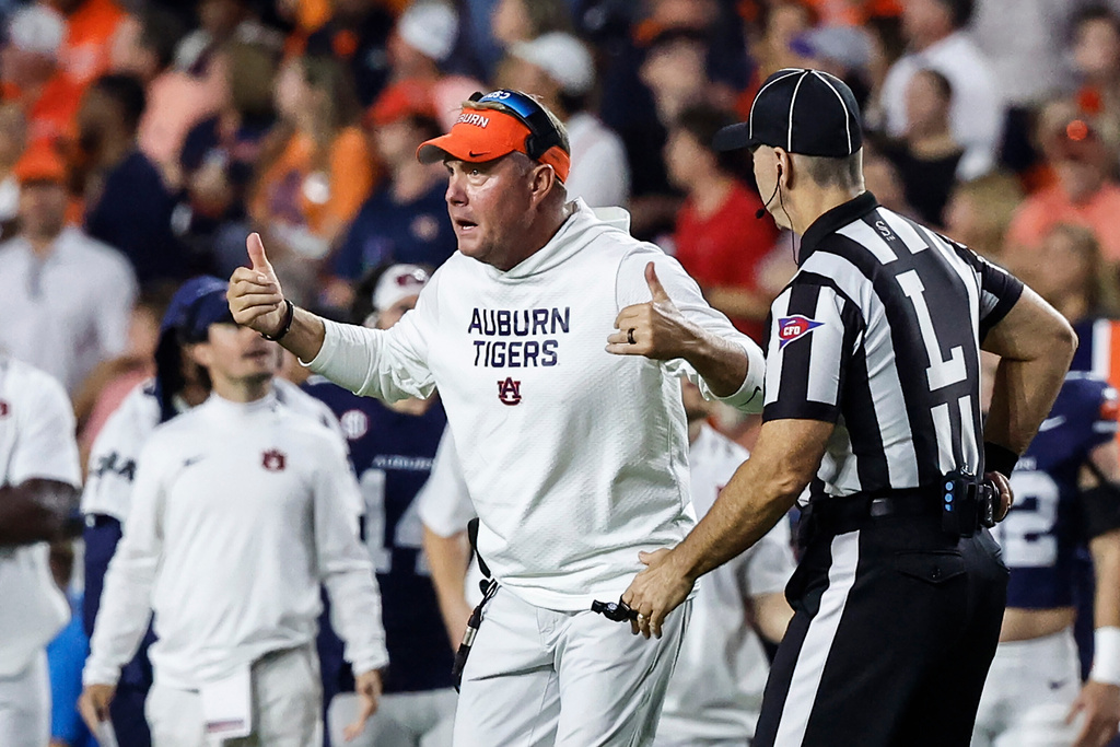 Auburn head coach Hugh Freeze reacts to a call during the second half of an NCAA college football game against Georgia, Saturday, Oct. 11, 2025, in Auburn, Ala. (AP Photo/Butch Dill)