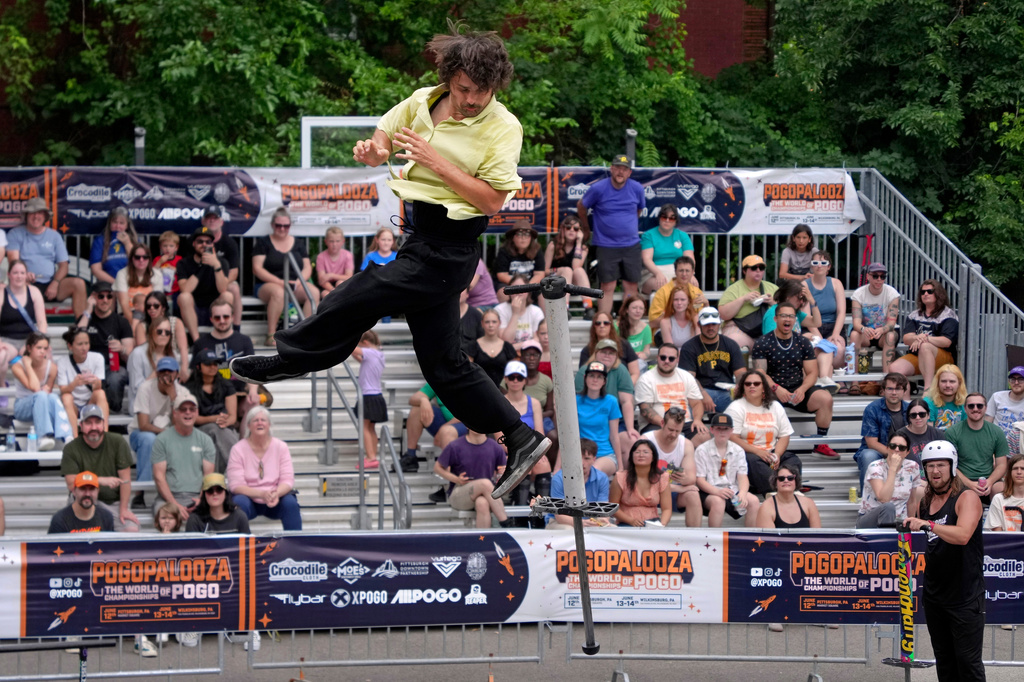 Seven-time world champion of extreme pogo Dalton Smith competes in the Best Trick competition during Pogopalooza 2026 in Wilkinsburg, Pa., Sunday, June 14, 2026. (AP Photo/Gene J. Puskar)