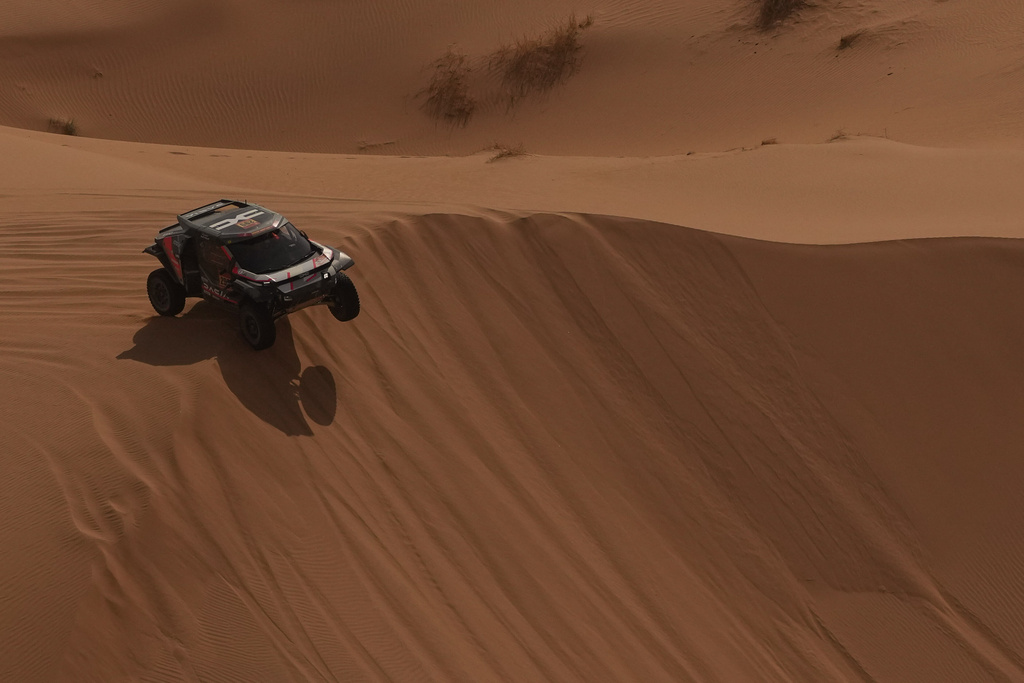 Driver Nasser Al-Attiyah and co-driver Fabian Lurquin compete during the seventh stage of the Dakar Rally between Riyadh and Wadi Ad Dawasir, Saudi Arabia, Sunday, Jan.11, 2026. (AP Photo/Thibault Camus)