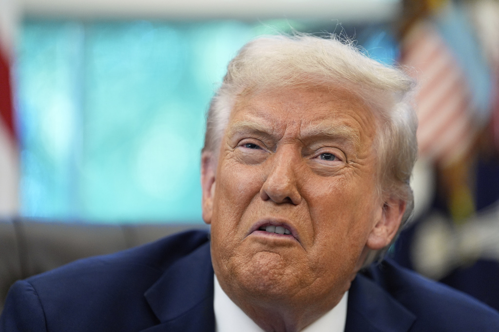 President Donald Trump speaks in the Oval Office of the White House, Friday, Sept. 19, 2025, in Washington. (AP Photo/Alex Brandon)