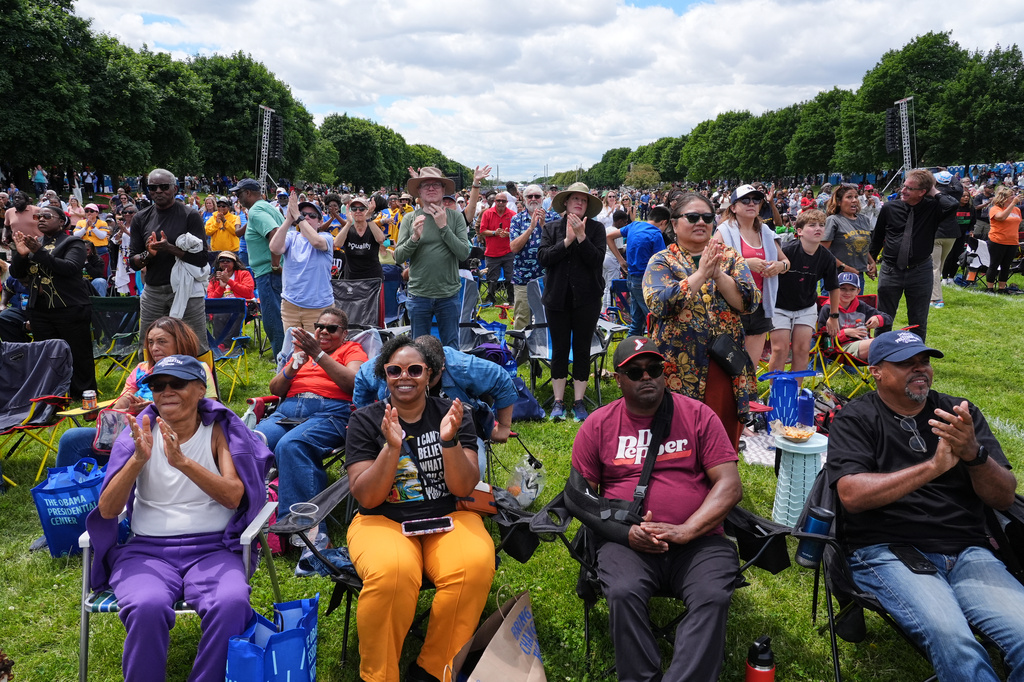 People watch the dedication ceremony for the Obama Presidential Center from Midway Plaisance, Thursday, June 18, 2026, in Chicago. (AP Photo/Nam Y. Huh)