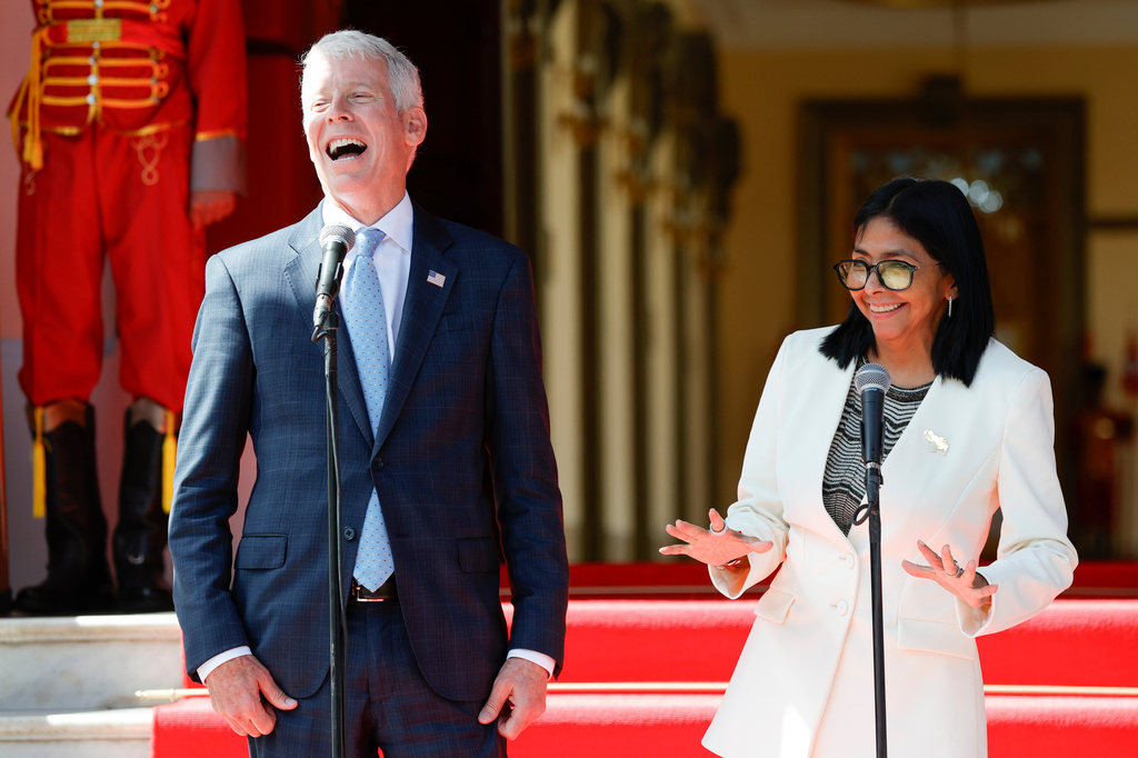 U.S. Energy Secretary Chris Wright, left, and Venezuelan acting President Delcy Rodriguez smile during a press conference after the signing of an oil agreement at Miraflores presidential palace in Caracas, Venezuela, Wednesday, Sept. 2, 2026. (AP Photo/Pedro Mattey)