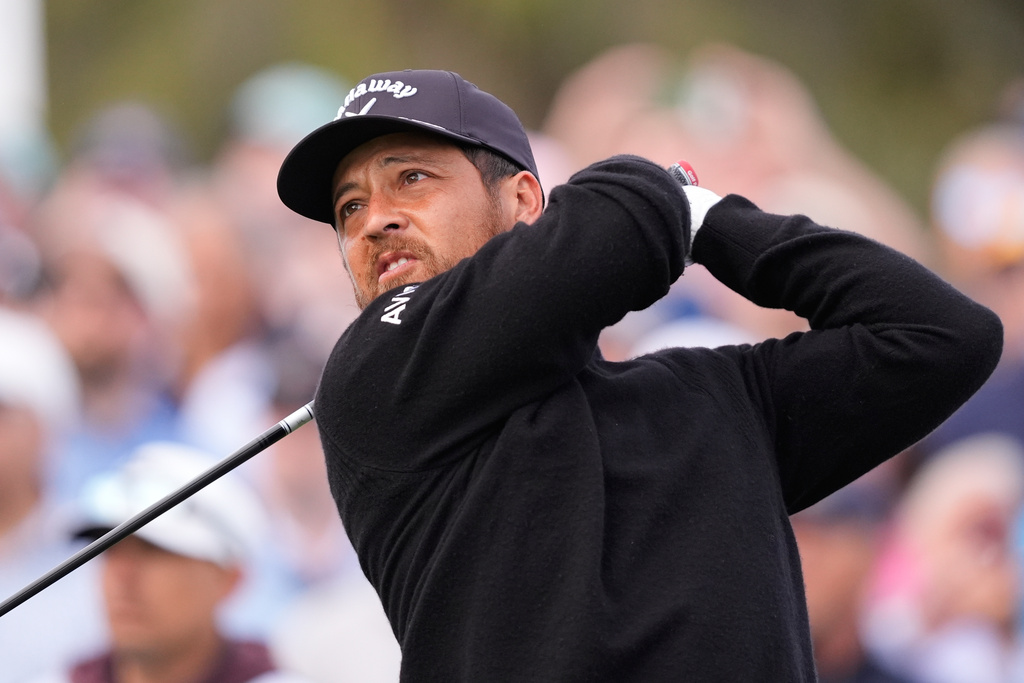 Xander Schauffele hits off the 10th tee during the second round of The Players Championship golf tournament Friday, March 13, 2026, in Ponte Vedra Beach, Fla. (AP Photo/Gerald Herbert)