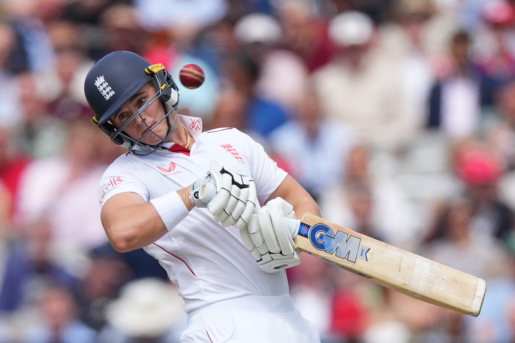 England's Jacob Bethell avoids a ball from New Zealand's Will O'Rourke during the second day of the test match between England and New Zealand at Lord's cricket ground in London, Friday, June 5, 2026. (AP Photo/Kirsty Wigglesworth)