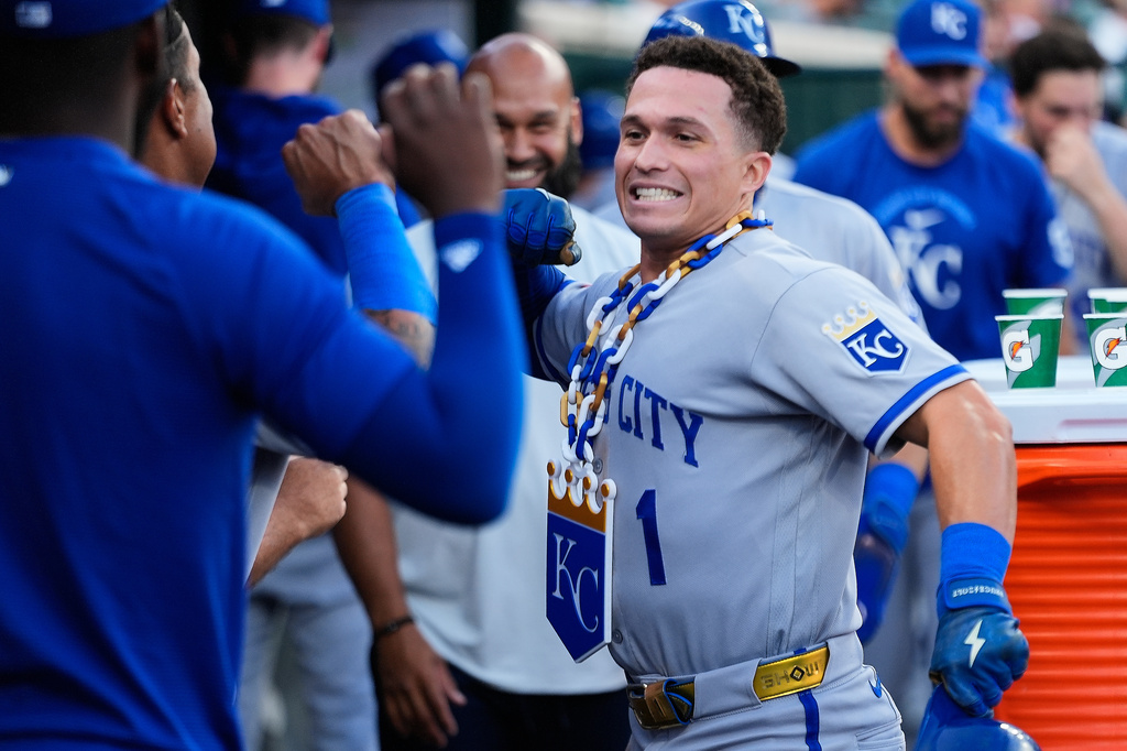 Kansas City Royals' Isaac Collins (1) celebrates his two-run home run against the Detroit Tigers during the sixth inning of a baseball game Thursday, July 23, 2026, in Detroit. (AP Photo/Paul Sancya)