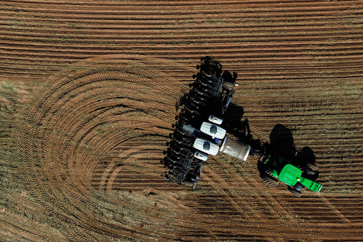 FILE - A seeder is pulled by tractor to plant soy on the Morada do Sol farm in Santa Cruz do Rio Pardo, Sao Paulo state, Brazil, Oct. 15, 2025. (AP Photo/Ettore Chiereguini) FILE - A seeder is pulled by tractor to plant soy on the Morada do Sol farm in Santa Cruz do Rio Pardo, Sao Paulo state, Brazil, Oct. 15, 2025. (AP Photo/Ettore Chiereguini)