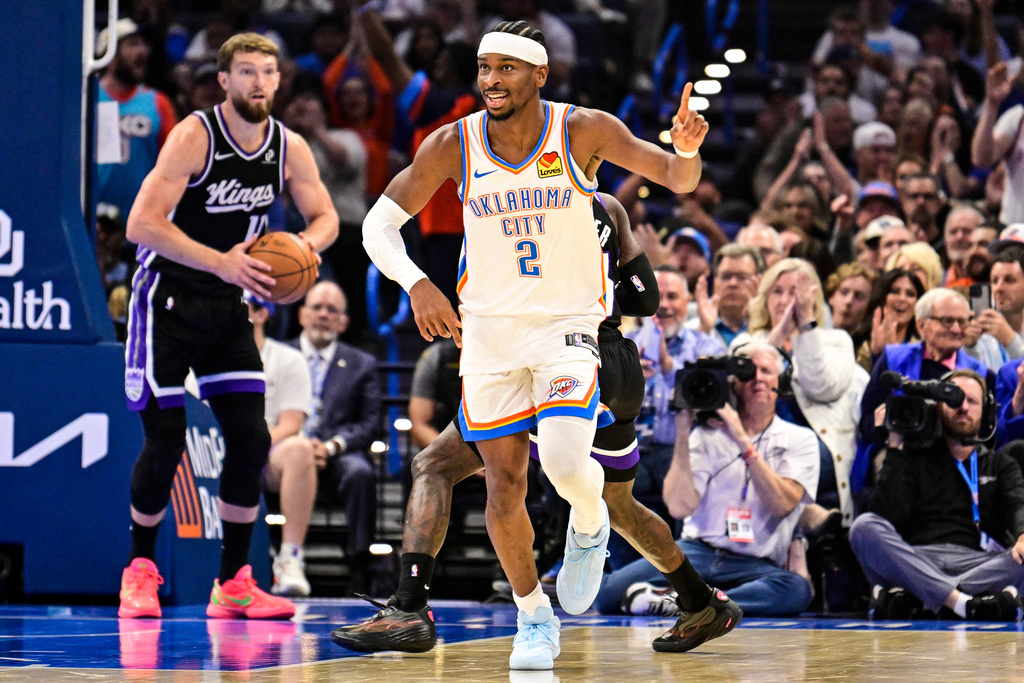Oklahoma City Thunder guard Shai Gilgeous-Alexander (2) gestures during the first half of an NBA basketball game between Sacramento Kings and Oklahoma City Thunder, Tuesday, Oct. 28, 2025, in Oklahoma City. (AP Photo/Gerald Leong)