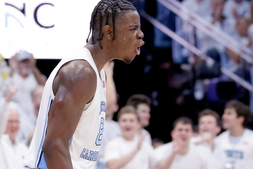 North Carolina forward Caleb Wilson celebrates after a turnover during the first half of an NCAA college basketball game against Kansas, Friday, Nov. 7, 2025, in Chapel Hill, N.C. (AP Photo/Chris Seward)