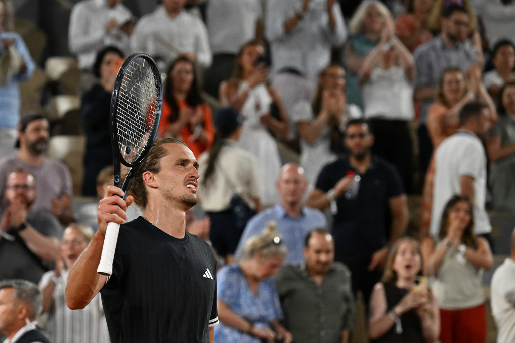 Alexander Zverev of Germany celebrates winning the third round men's singles tennis match against Quentin Halys of France at the French Open tennis tournament in Paris, Friday, May 29, 2026. (AP Photo/Emma Da Silva)