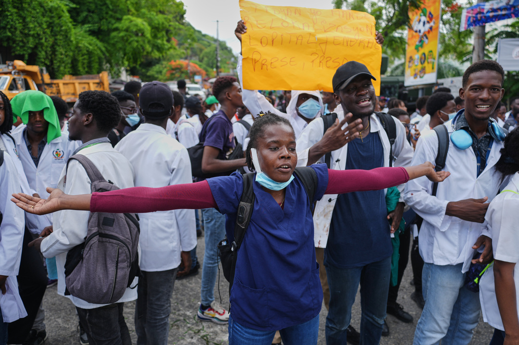 Medical students chant slogans during a protest demanding the reopening of the General Hospital in Port-au-Prince, Haiti, Wednesday, July 1, 2026. (AP Photo/Odelyn Joseph)