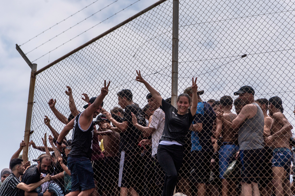 Migrants cross from Morocco into the Spanish enclave of Ceuta, Thursday, July 30, 2026. (AP Photo/Antonio Sempere)