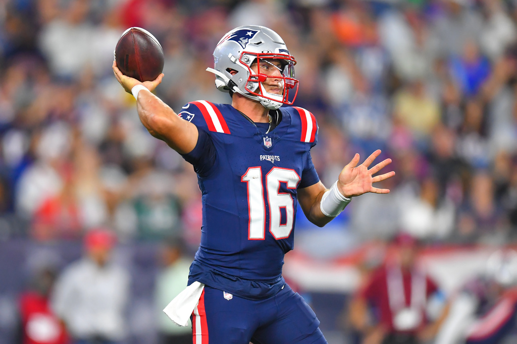 New England Patriots quarterback Tommy DeVito (16) throws against the Philadelphia Eagles during the first half of an NFL preseason football game, Saturday, Aug. 22, 2026, in Foxborough, Mass. (AP Photo/Steven Senne)