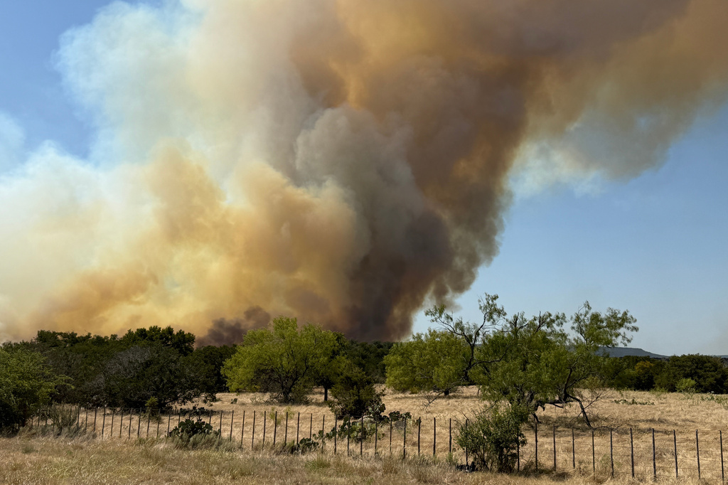 The Ross Fire burns in Palo Pinto County, Texas, on Monday, Aug. 24, 2026. (Texas A&M Forest Service via AP)
