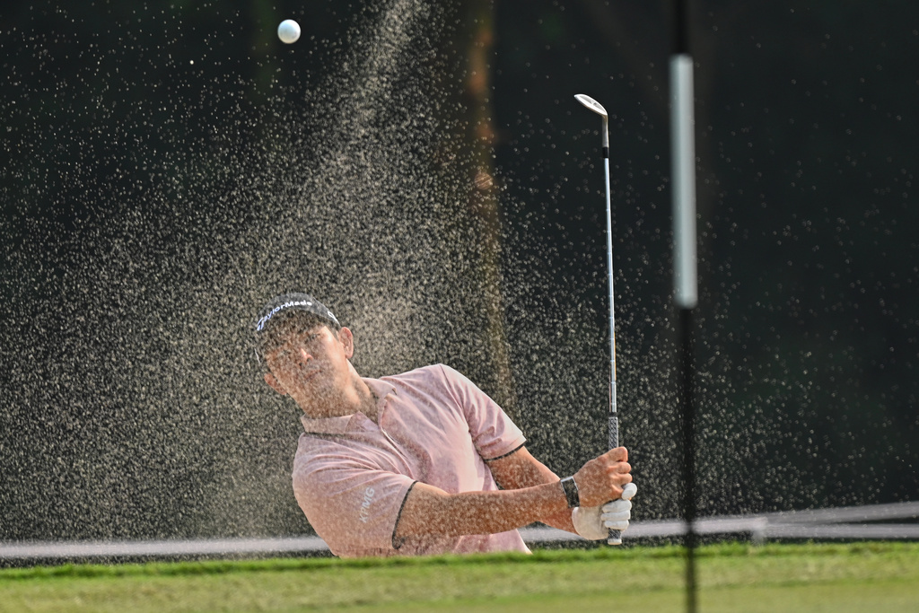 Keita Nakajima of Japan plays a shot from the sand pit during the DP World Tour Championship golf tournament in New Delhi, India, Saturday, Oct.18, 2025. (AP Photo/Dharam Diwakar)