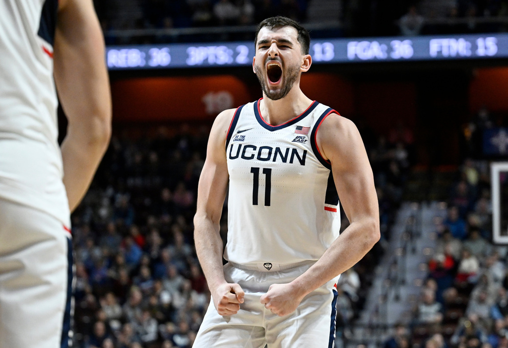 UConn forward Alex Karaban reacts during the second half of an exhibition NCAA college basketball game against Boston College, Monday, Oct. 13, 2025, in Uncasville, Conn. (AP Photo/Jessica Hill)