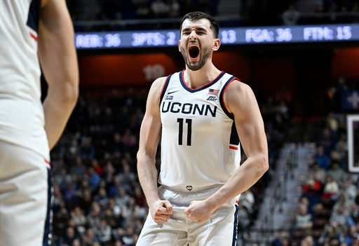 UConn forward Alex Karaban reacts during the second half of an exhibition NCAA college basketball game against Boston College, Monday, Oct. 13, 2025, in Uncasville, Conn. (AP Photo/Jessica Hill) UConn forward Alex Karaban reacts during the second half of an exhibition NCAA college basketball game against Boston College, Monday, Oct. 13, 2025, in Uncasville, Conn. (AP Photo/Jessica Hill)