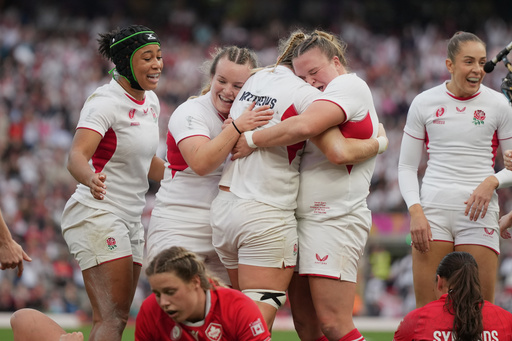 England's Alex Matthews, third left, celebrates with her teammates after scoring a try during the Women's Rugby World Cup final match between England and Canada at the Allianz Stadium, Twickenham, London, Saturday, Sept. 27, 2025. (AP Photo/Alastair Grant) England's Alex Matthews, third left, celebrates with her teammates after scoring a try during the Women's Rugby World Cup final match between England and Canada at the Allianz Stadium, Twickenham, London, Saturday, Sept. 27, 2025. (AP Photo/Alastair Grant)