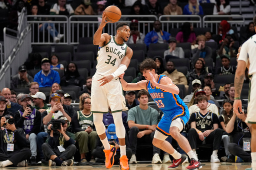 Milwaukee Bucks forward Giannis Antetokounmpo (34) passes the ball against Oklahoma City Thunder guard Brooks Barnhizer (23) during the second half of a preseason NBA basketball game Tuesday, Oct. 14, 2025, in Milwaukee. (AP Photo/Kayla Wolf) Milwaukee Bucks forward Giannis Antetokounmpo (34) passes the ball against Oklahoma City Thunder guard Brooks Barnhizer (23) during the second half of a preseason NBA basketball game Tuesday, Oct. 14, 2025, in Milwaukee. (AP Photo/Kayla Wolf)
