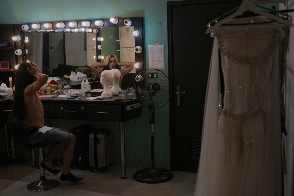 Alexandre Paulikevitch gets ready backstage before performing at a popular theatre in Beirut, Lebanon, Thursday, Sept. 11, 2025. (AP Photo/Hussein Malla)