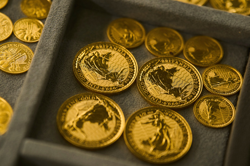 FILE - A collection of gold coins is displayed at a shop in the St. Vincent Jewelry Center in the Jewelry District of Los Angeles, April 30, 2025. (AP Photo/Jae C. Hong, file) FILE - A collection of gold coins is displayed at a shop in the St. Vincent Jewelry Center in the Jewelry District of Los Angeles, April 30, 2025. (AP Photo/Jae C. Hong, file)