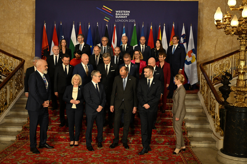 Leaders and delegates prepare to pose for the group photo during a Western Balkans Summit in London, Wednesday, Oct. 22, 2025. (Chris J Ratcliffe/Pool Photo via AP)