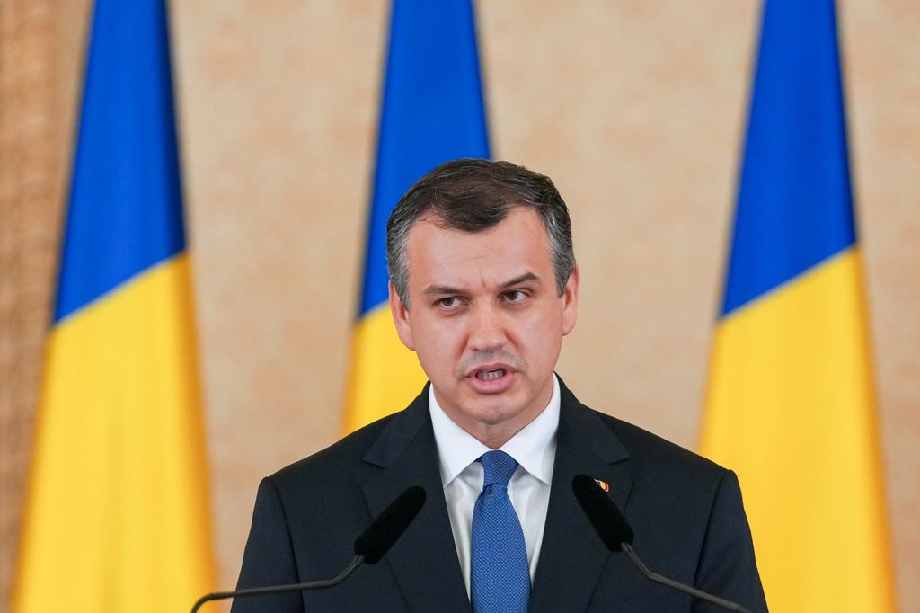 Prime Minister designate Eugen Tomac speaks during press statements at the Cotroceni Presidential Palace in Bucharest, Romania, Thursday, June 4, 2026. (AP Photo/Vadim Ghirda)